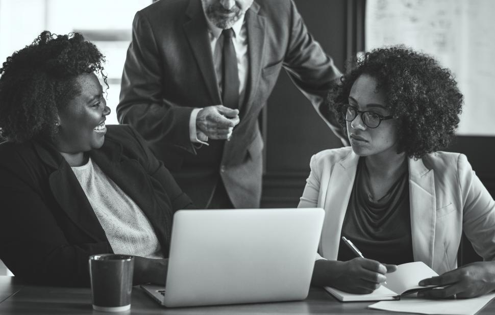 colleagues-in-a-business-meeting–black-and-white-photo colleagues-in-a-business-meeting--black-and-white-photo